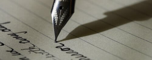 Pen writing on paper