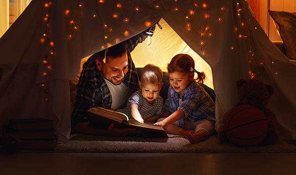 Family reading good night stories