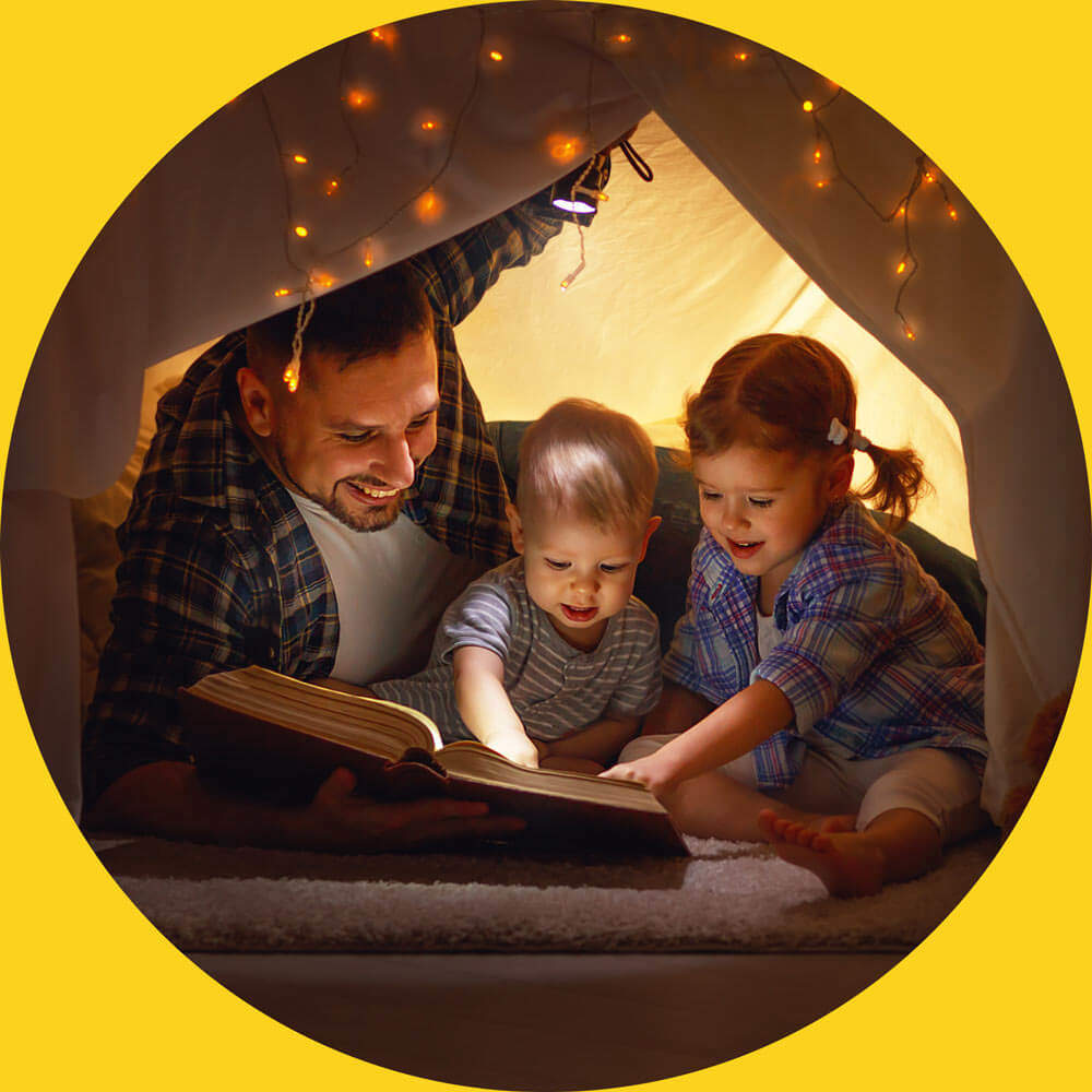 Family reading good night stories